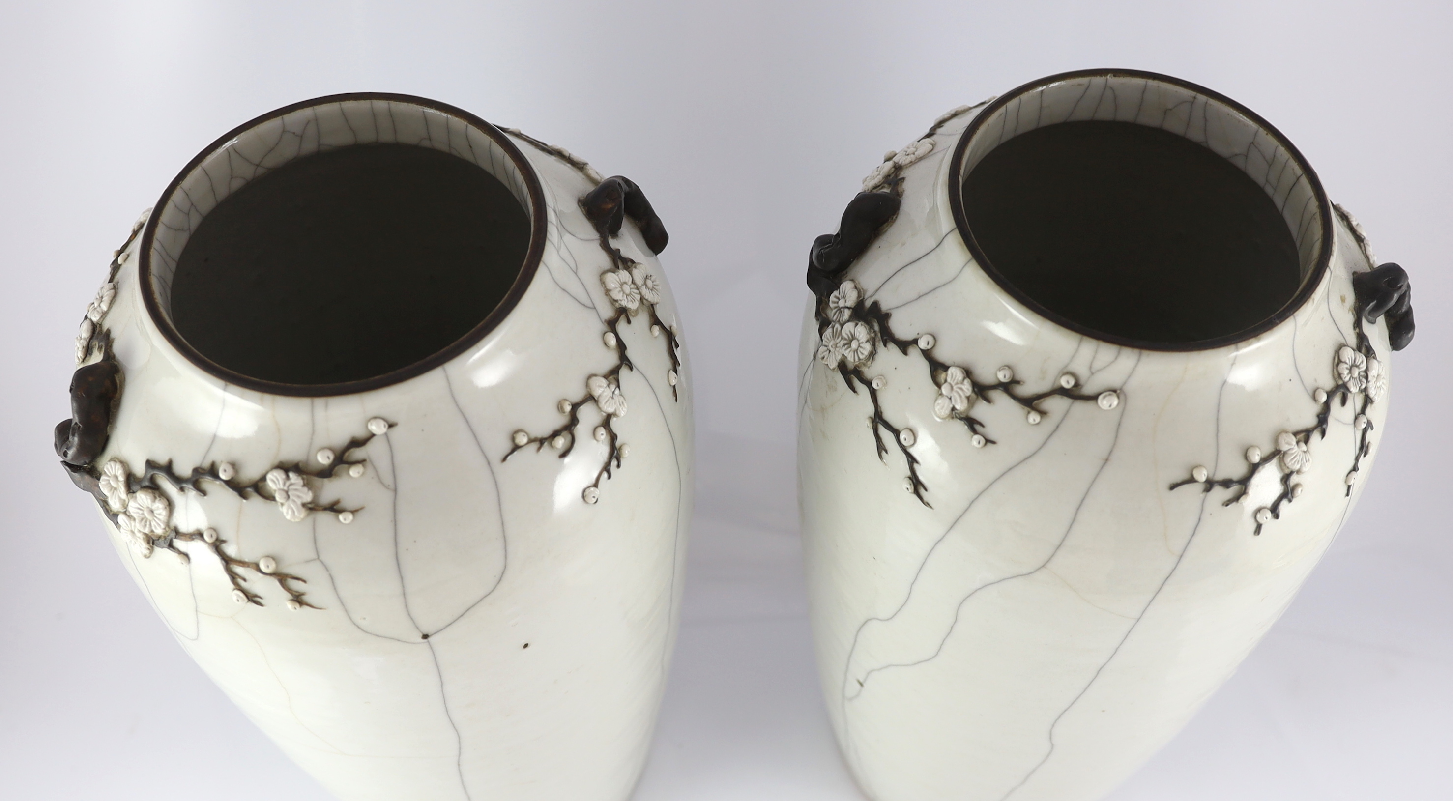 A pair of large Chinese white crackle glaze vases, late 19th/early 20th century